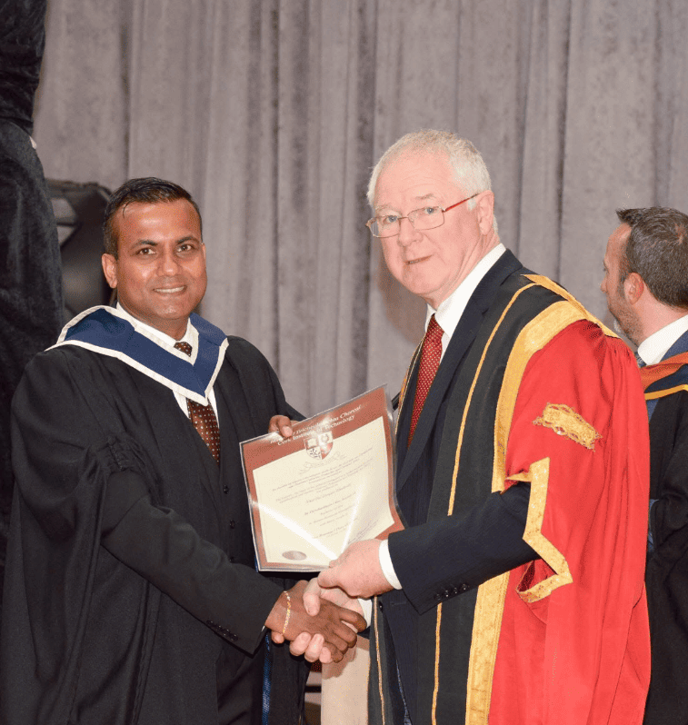 OGCL founder receiving degree from university chancellor